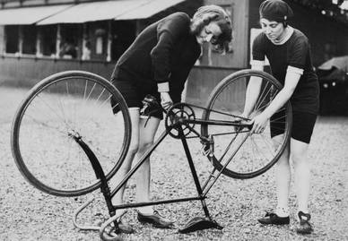 Women fixing a bike